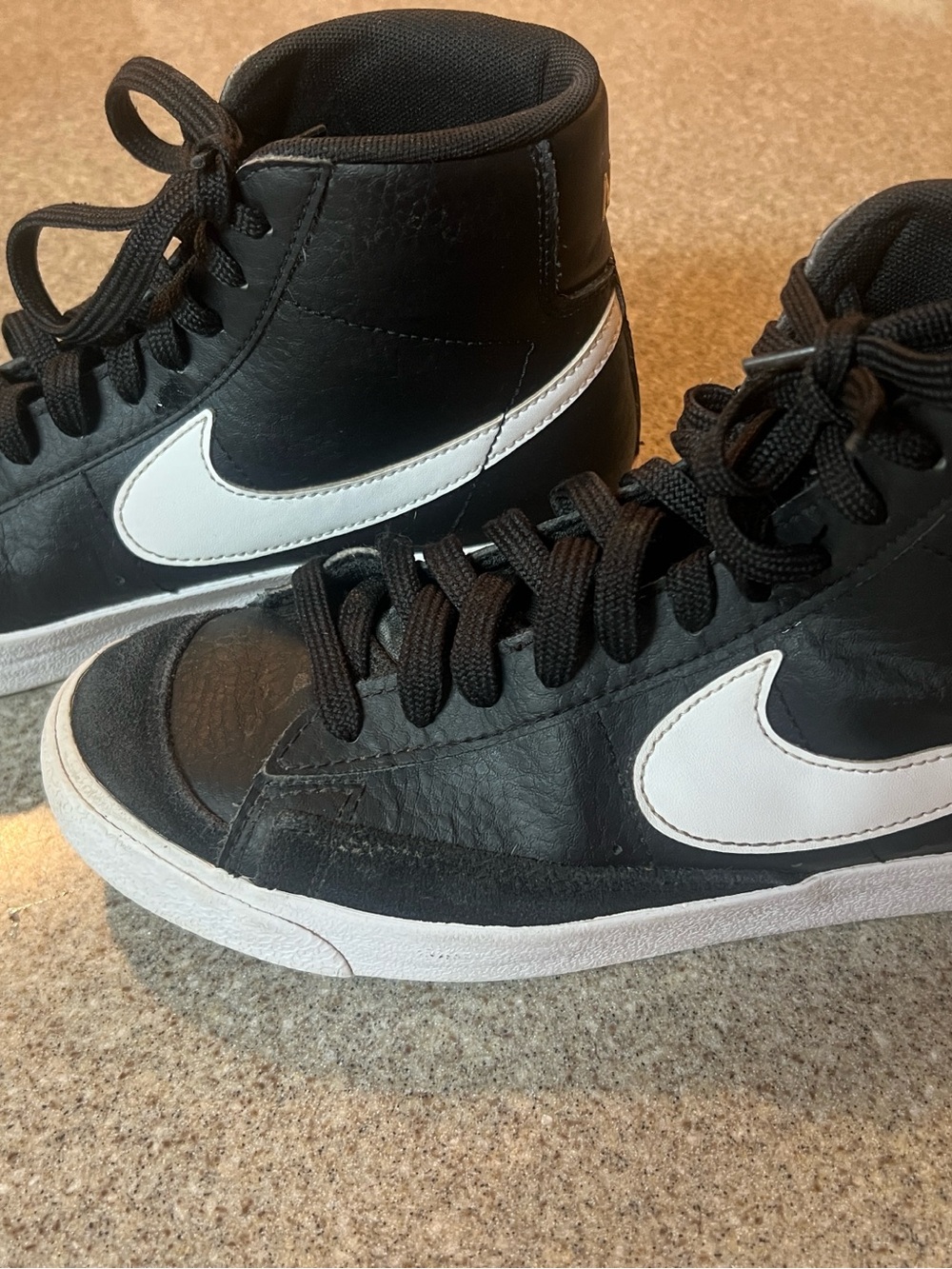 Nike Men’s Black and White High-Top Sneakers with White Swoosh